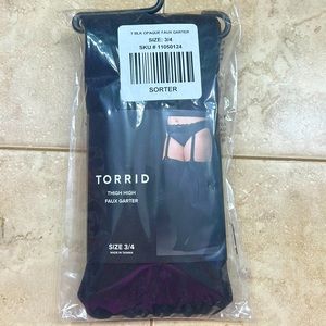 New in package Torrid faux Garter Tights Size 3/4